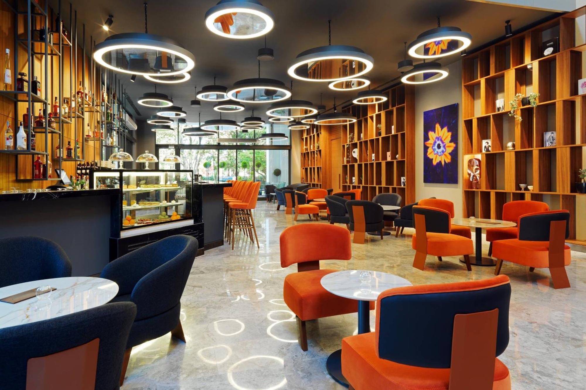 Sheraton Batumi Hotel Luaran gambar The interior of a Starbucks Reserve store in Shanghai, China